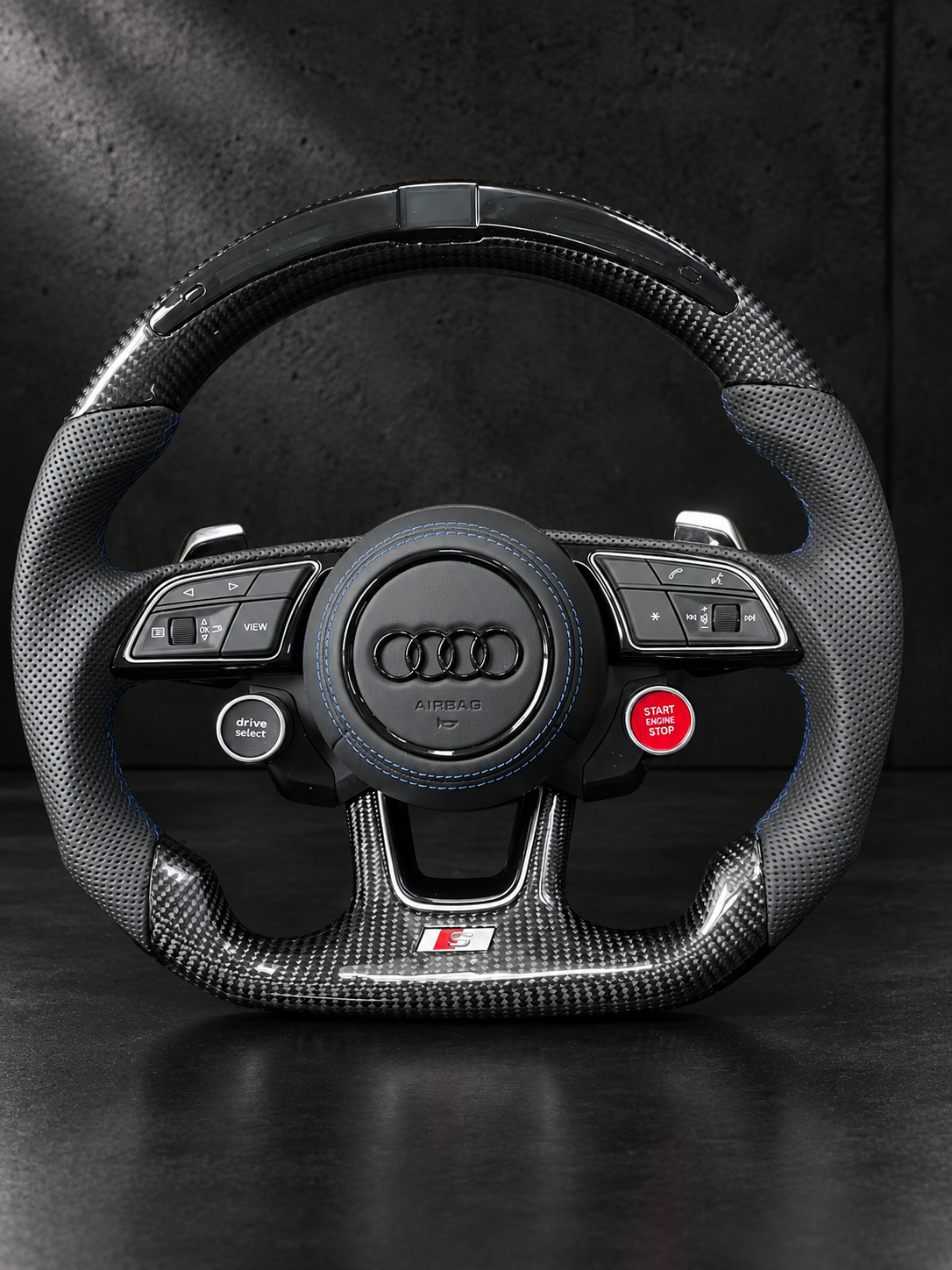 Volante Audi Sport – Carbono, LED y Costuras Azules